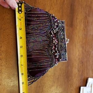 Violet beaded clutch